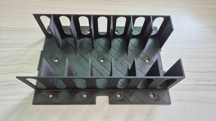 One of the 3D-printed structural supports used throughout the frame.