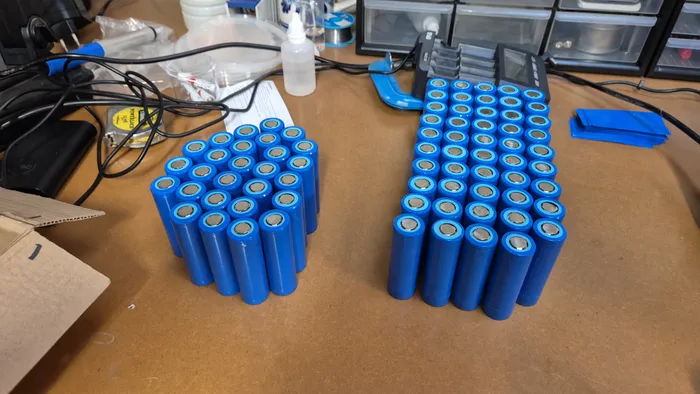 Dozens of cells, ready to be grouped into packs.