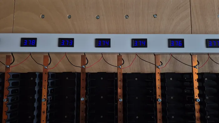 Each display shows the voltage of its series group.